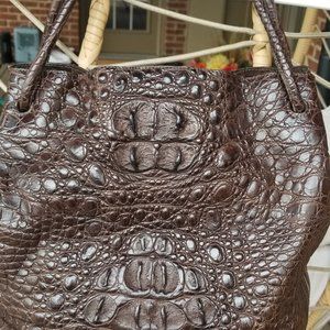 Women's brown bag made of genuine crocodile leather